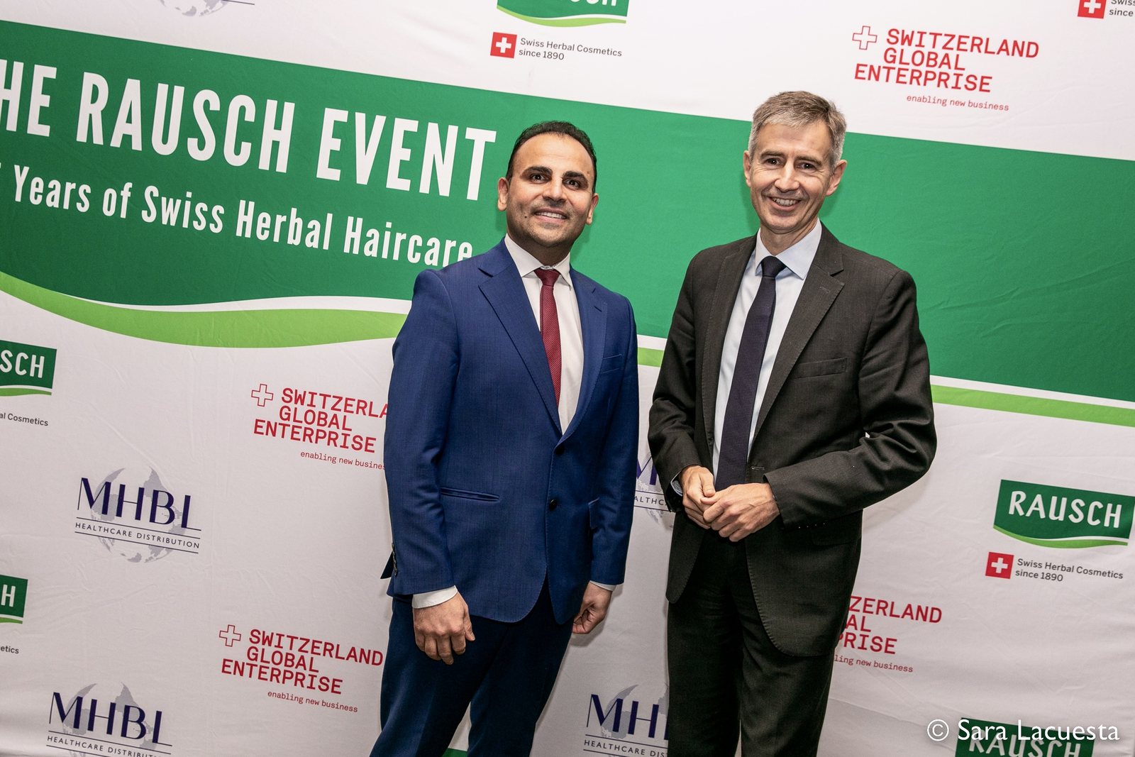 Raj Sandhan at the Rausch event marking 135 years of Swiss herbal haircare, in front of MHBL and Switzerland Global Enterprise branding